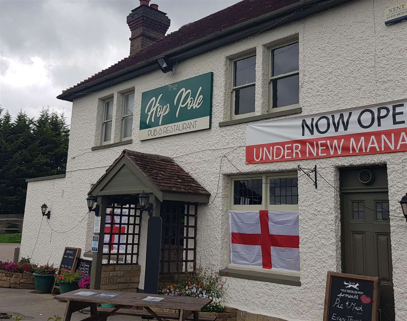Like many pubs in the country, The Hop Pole Inn is decked out in England flags for Euro 2020