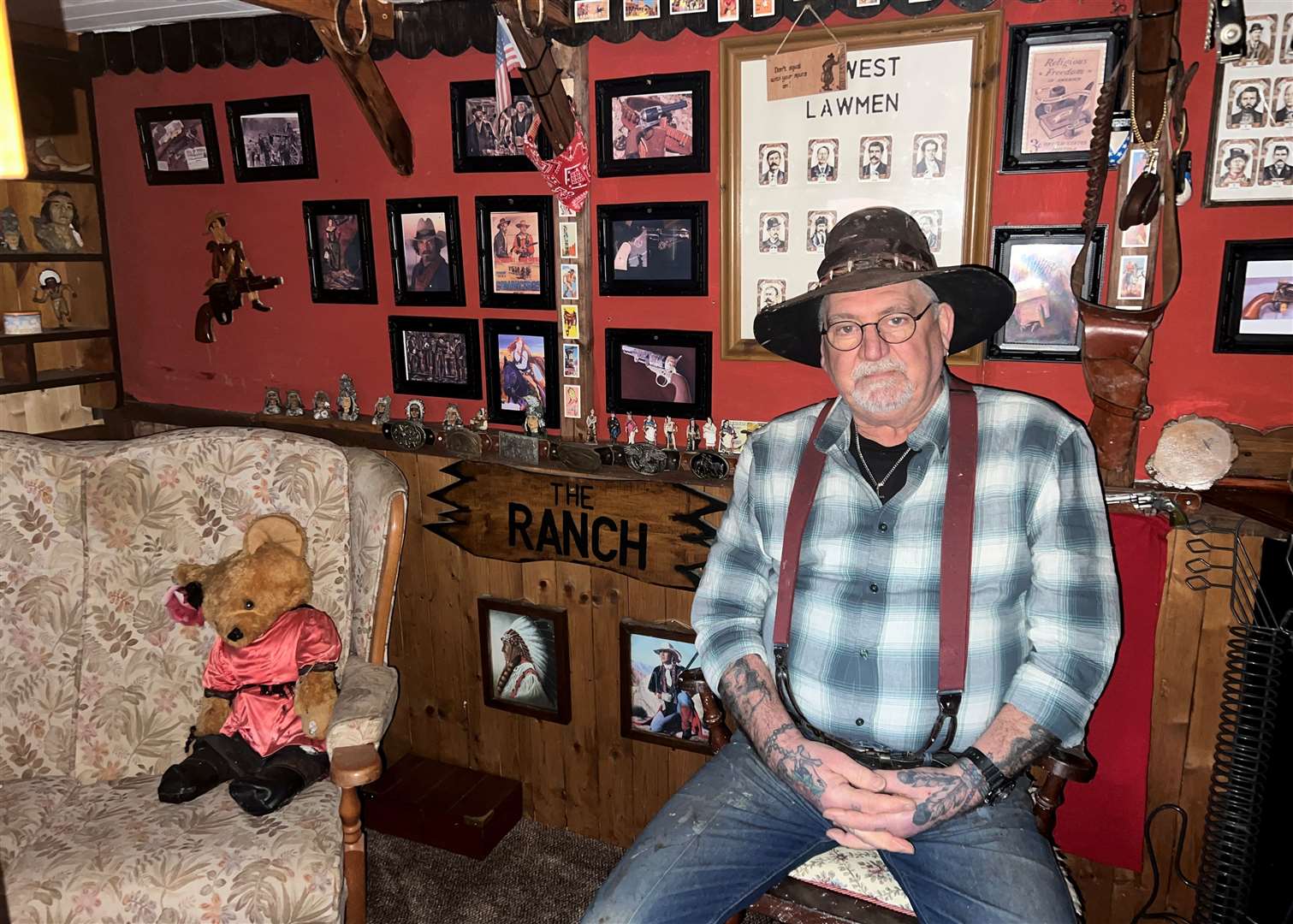 Stephen Smart inside one of his Wild West town buildings in his Sheppey back garden. Picture: Megan Carr
