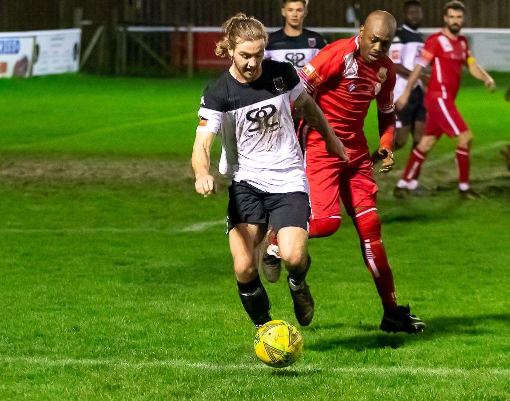 Faversham's Lewis Chambers in action against Whitstable earlier in the season in a defeat at Salters Lane. Picture: Les Biggs