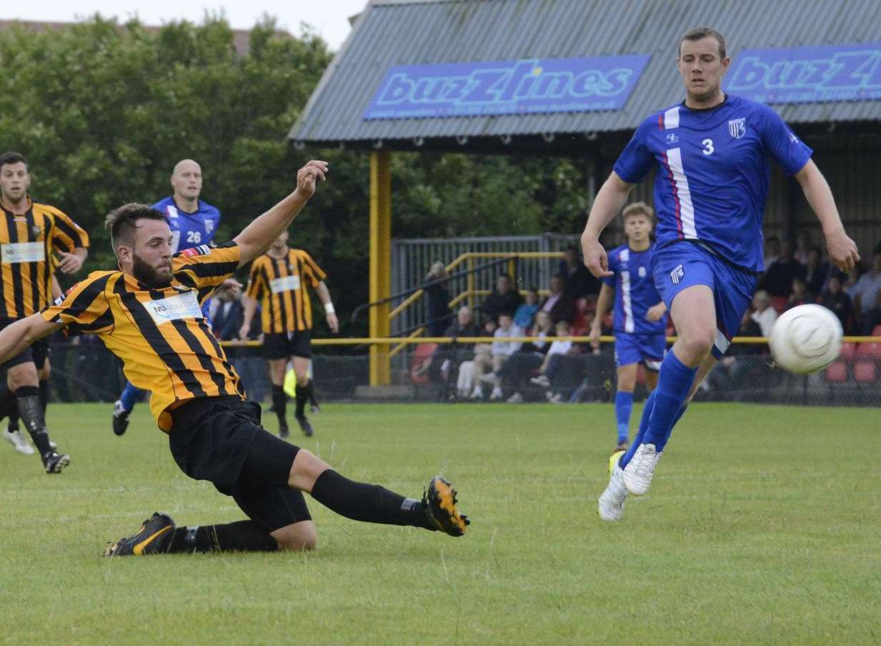 Gary Borrowdale can't stop Josh Vincent scoring for Folkestone Picture: Paul Amos