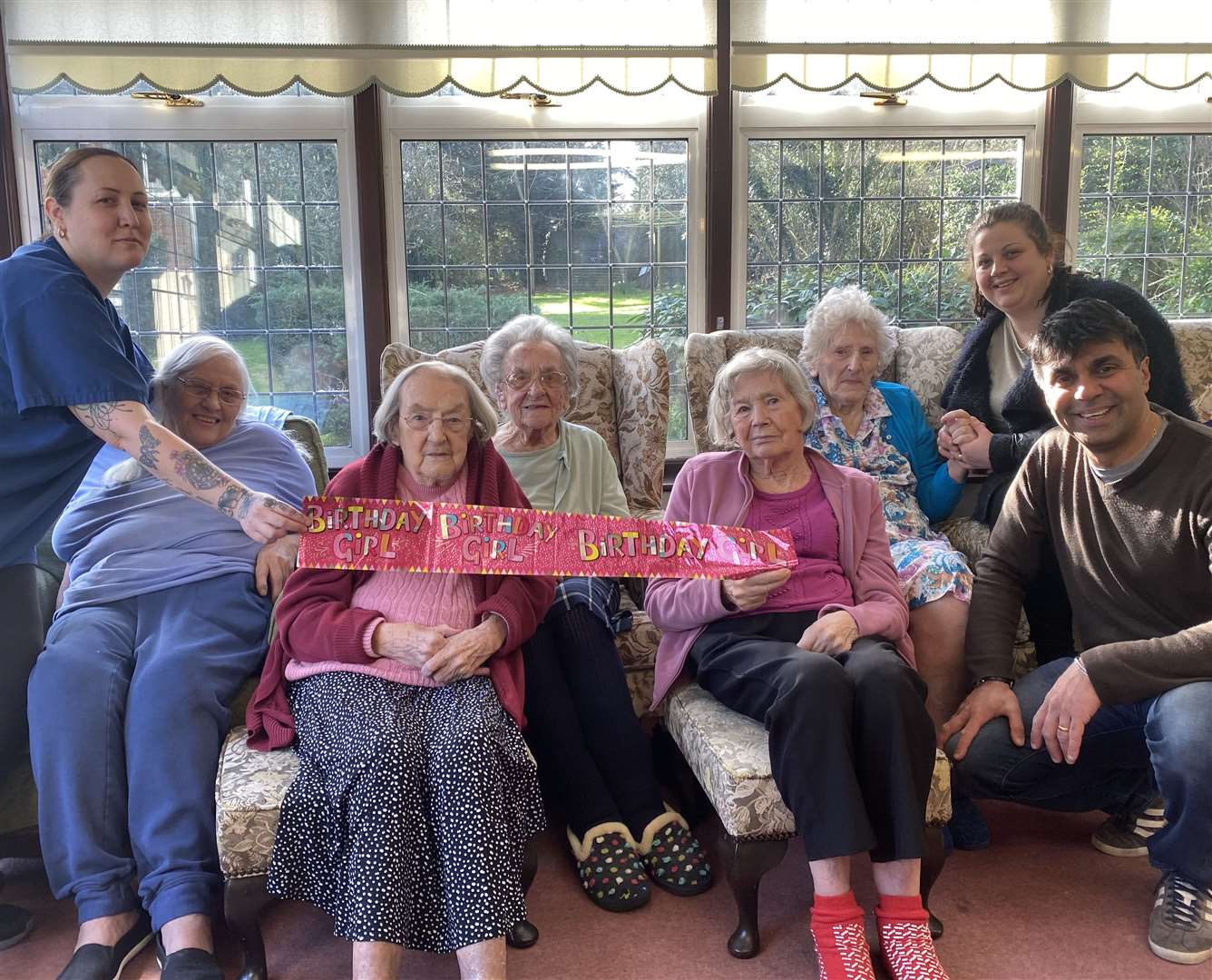 From left, care assistant Maria, Jean, 78, Margorie, aged 100, Ivy, Jean, aged 87, Rose, aged 93, care assistant Stacè, and care home owner, Richy, celebrating Ivy's birthday