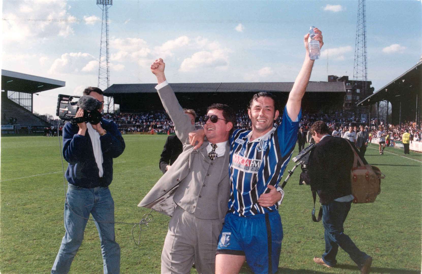 Gillingham chairman Paul Scally with Neil Smith celebrating promotion