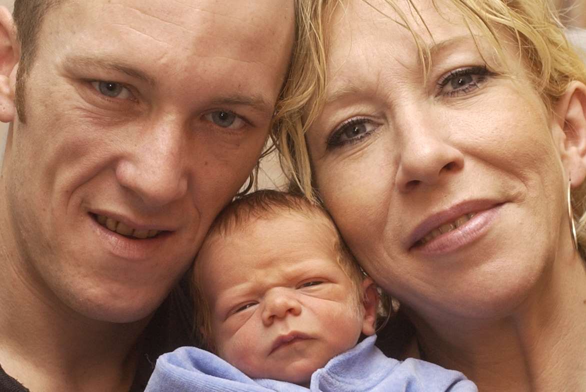 Darren Dixon and Sally Jones with baby Joe Dixon born in 2004.