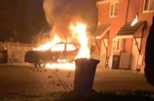 The car was set on fire close to the family's home in the early hours