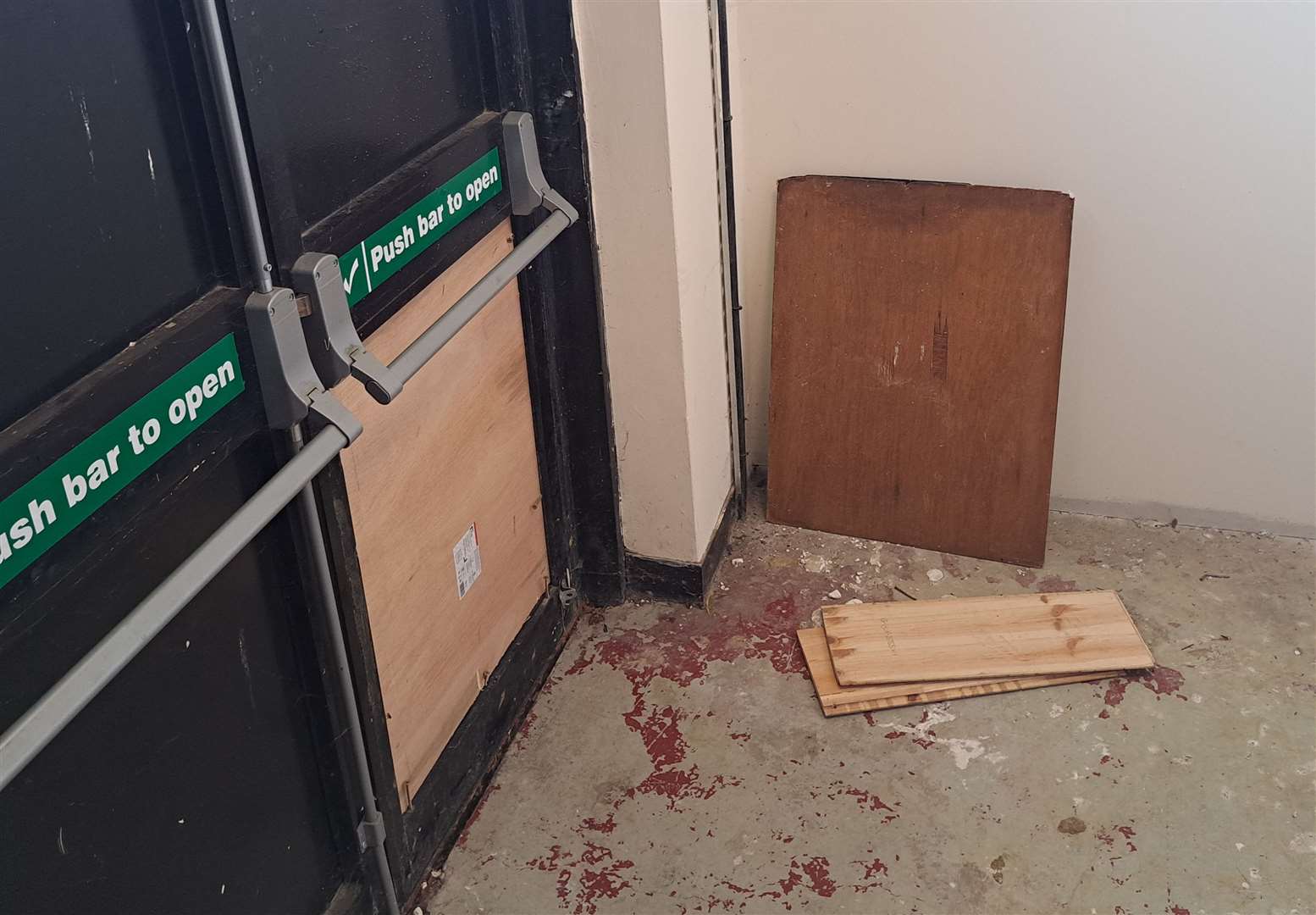 A kicked-in fire door that had to be repaired at The Panorama in Ashford