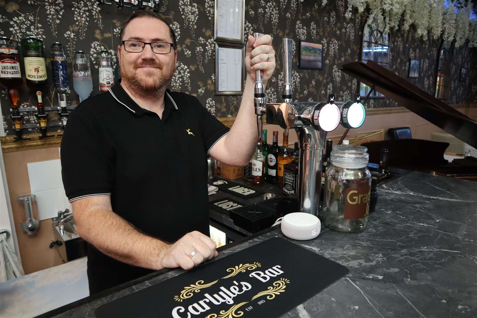 Boss Cllr Lee McCall behind the bar at Carlyle's Restaurant in Rose Street, Sheerness. Picture: John Nurden