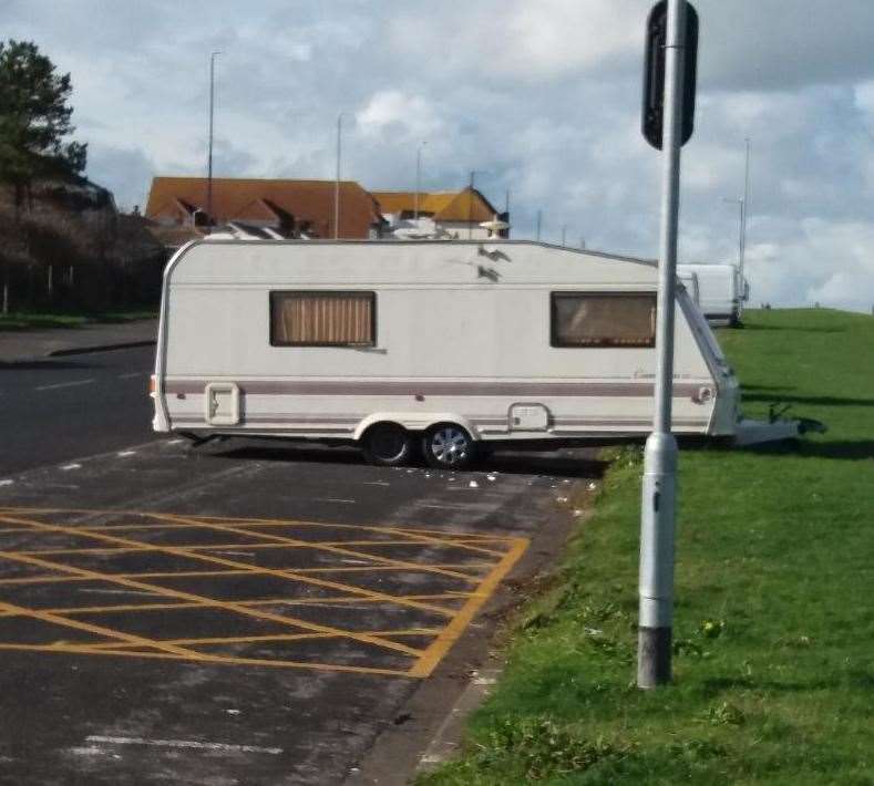 Caravans have pitched-up in unrestricted parking spaces in Palm Bay Avenue