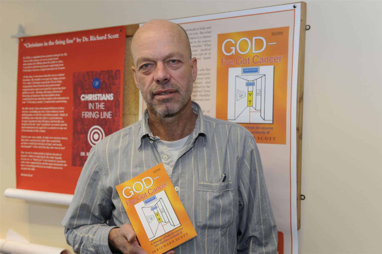 Dr Richard Scott with a book he had published .Picture: Tony Flashman