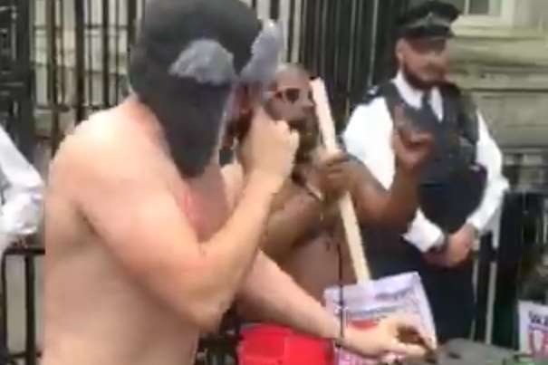 Disco Boy joined by another half-naked man in Downing Street