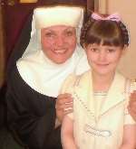 Sophie Wythe as Marta von Trapp in the London Palladium production of The Sound of Music with Suzy Fenwick who plays Sister Margeretta