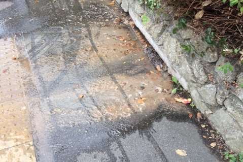 The overflowing sewer has resulted in footpaths and crossings in London Road being covered in human waste