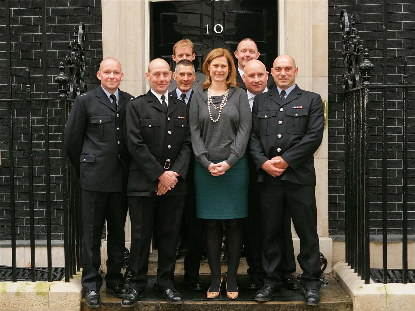 Malcolm Cowie (front row, second from left) with other Kent firefighters who were thanked by Sarah Brown at Number 10 Downing Street for their efforts in Haiti Photo: West Midlands Fire and Rescue Service