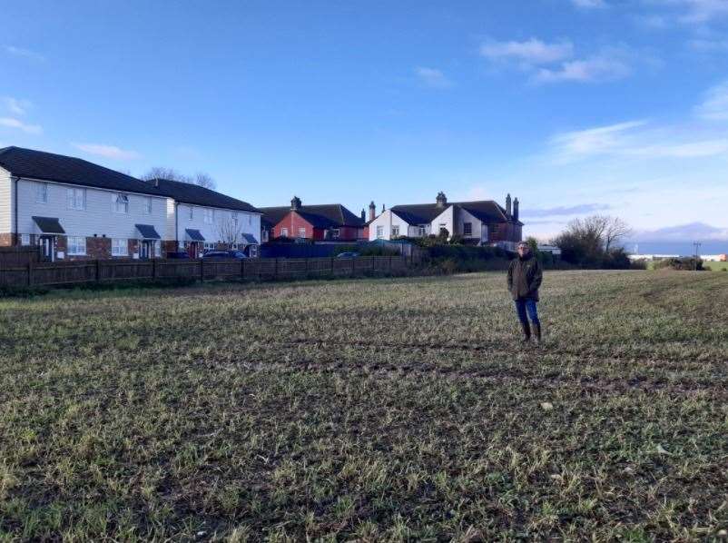 Resident David Dunford last December standing 25m away from the current boundary to show how close the back end of the Inland Border Facility could be built
