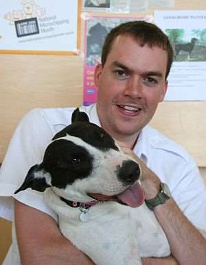Andrew Kirby, manager of the RSPCA's East Kent Animal Centre, and one of his three rescue dogs Badger whom he handreared, prepare for the centre's dog show. Picture: Mary Louis