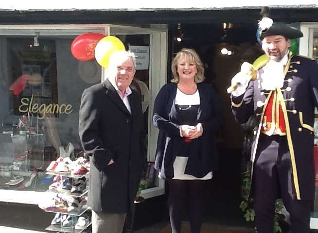 Sandwich Mayor Cllr Paul Graeme, owner Gillian Hardy, and Kevin Cook, the town crier, mark the shop's 5th birthday