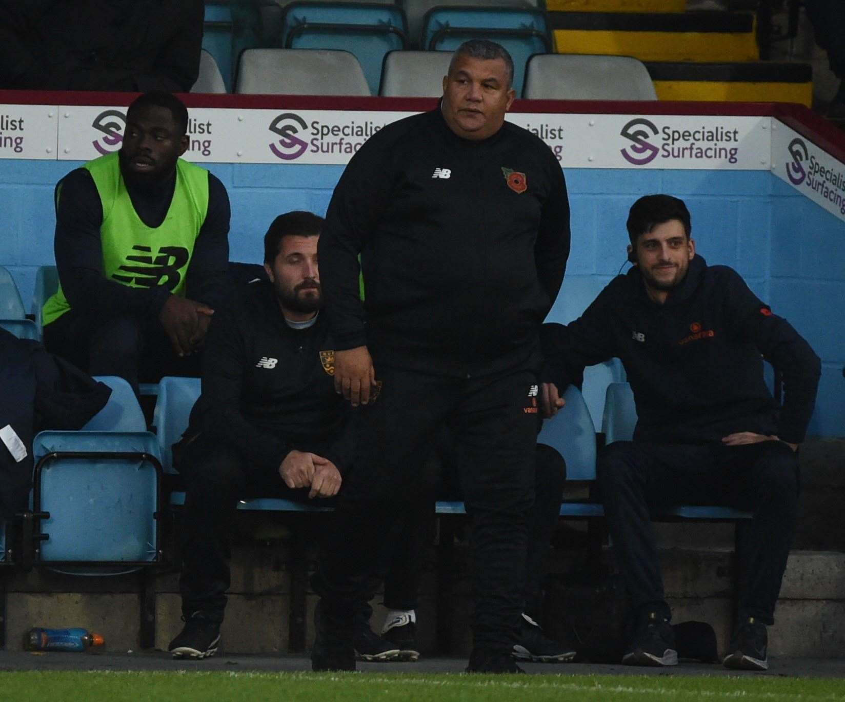 Maidstone United manager Hakan Hayrettin on the touchline at Glanford Park. Picture: Steve Terrell