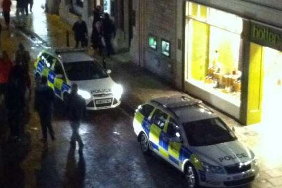 Several police cars surrounded the NatWest in Canterbury. Picture: Simon Jones