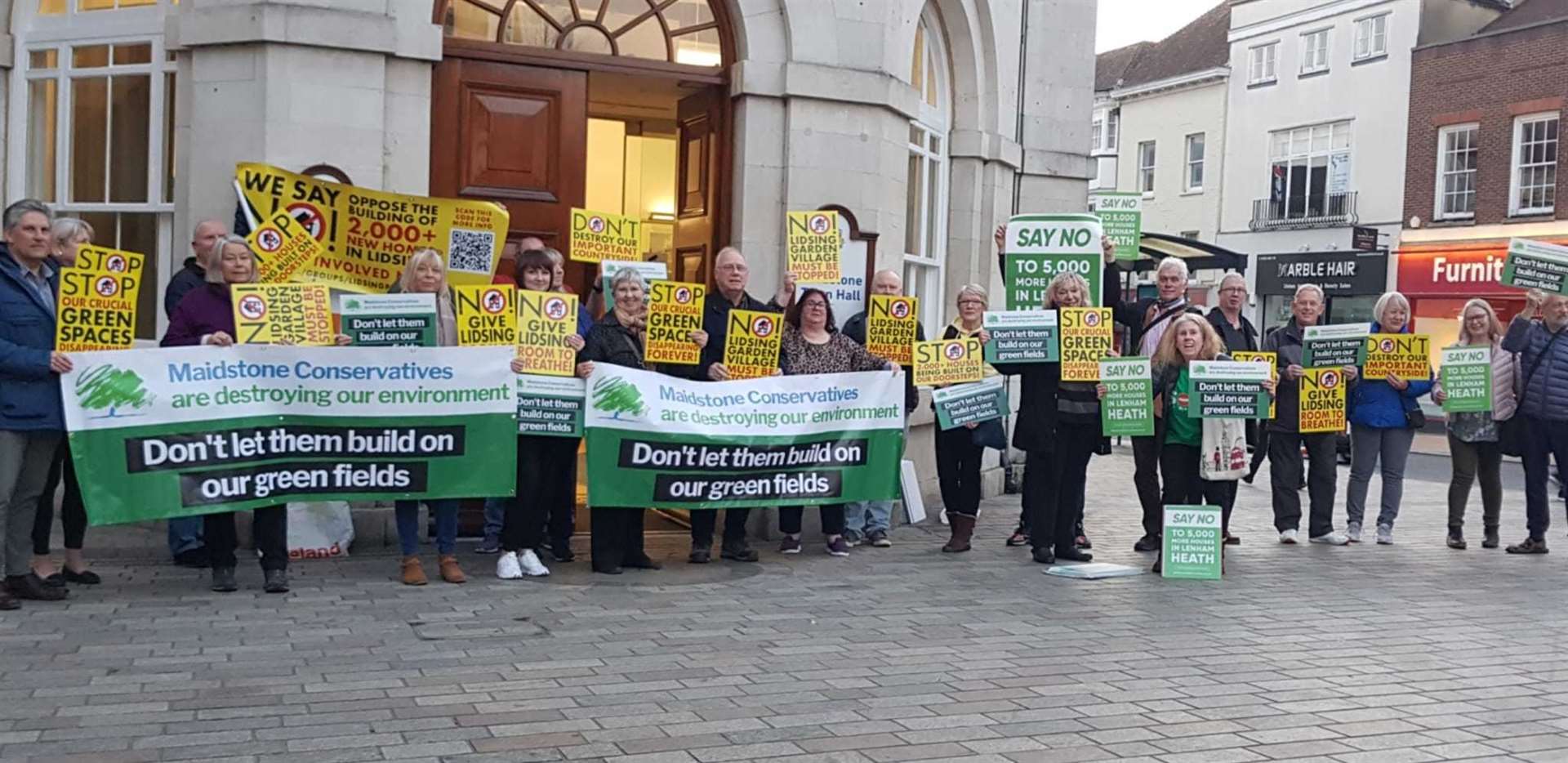 Protestors campaigning against the Lidsing development, outside Maidstone Town Hall in March