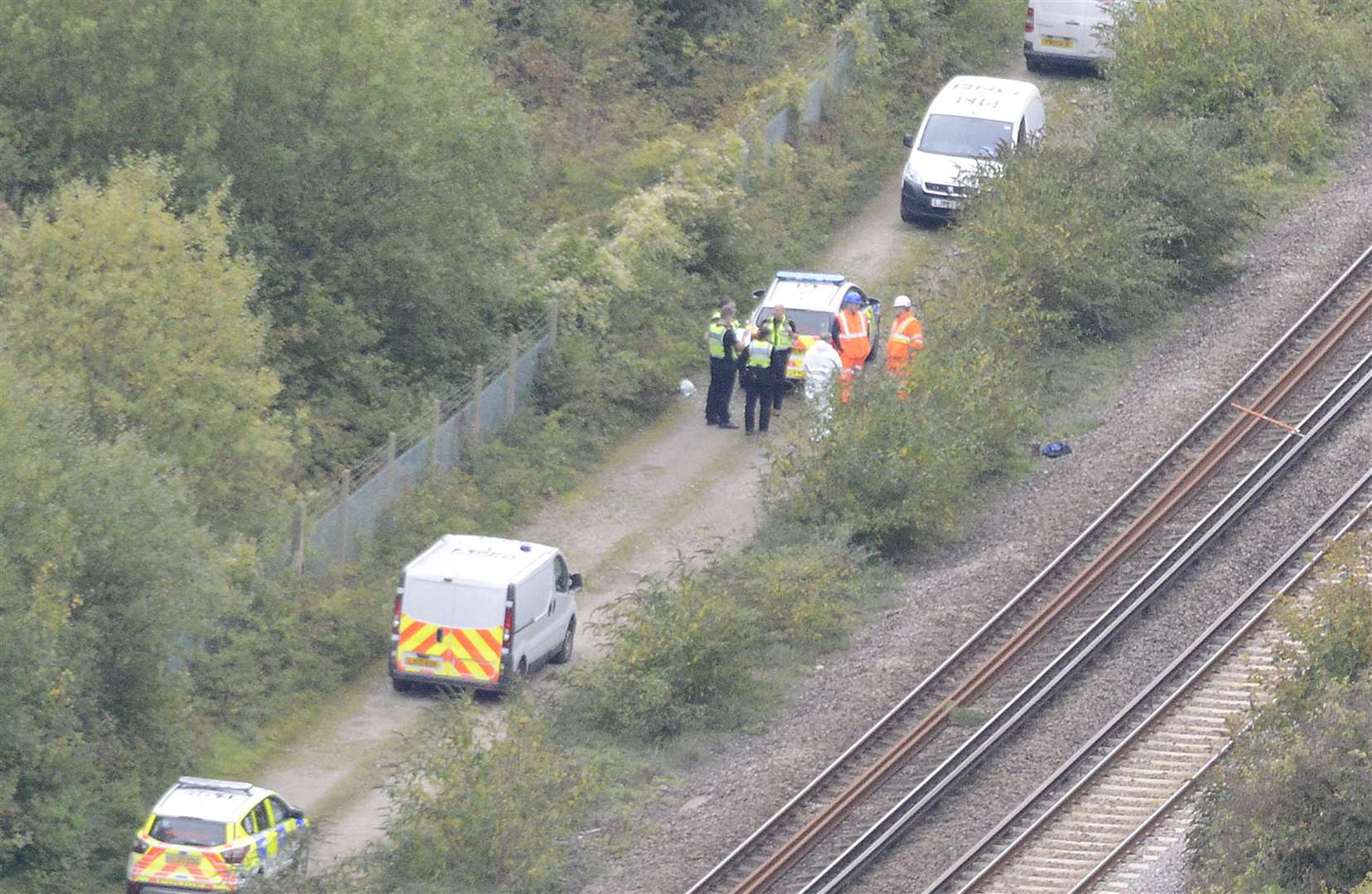 Police and rail officials at the scene. Picture: Paul Amos