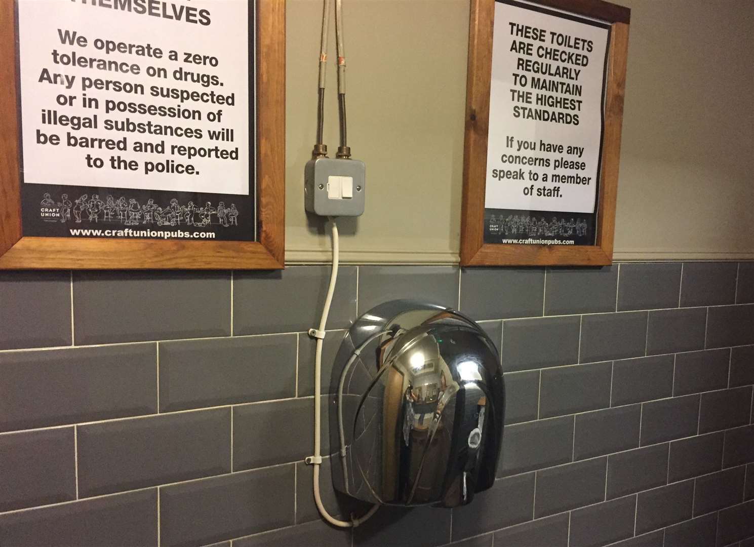 The hand dryer in the ladies is in much better nick than the one in the gents, but the same warning notice about drugs is prominent in both toilets
