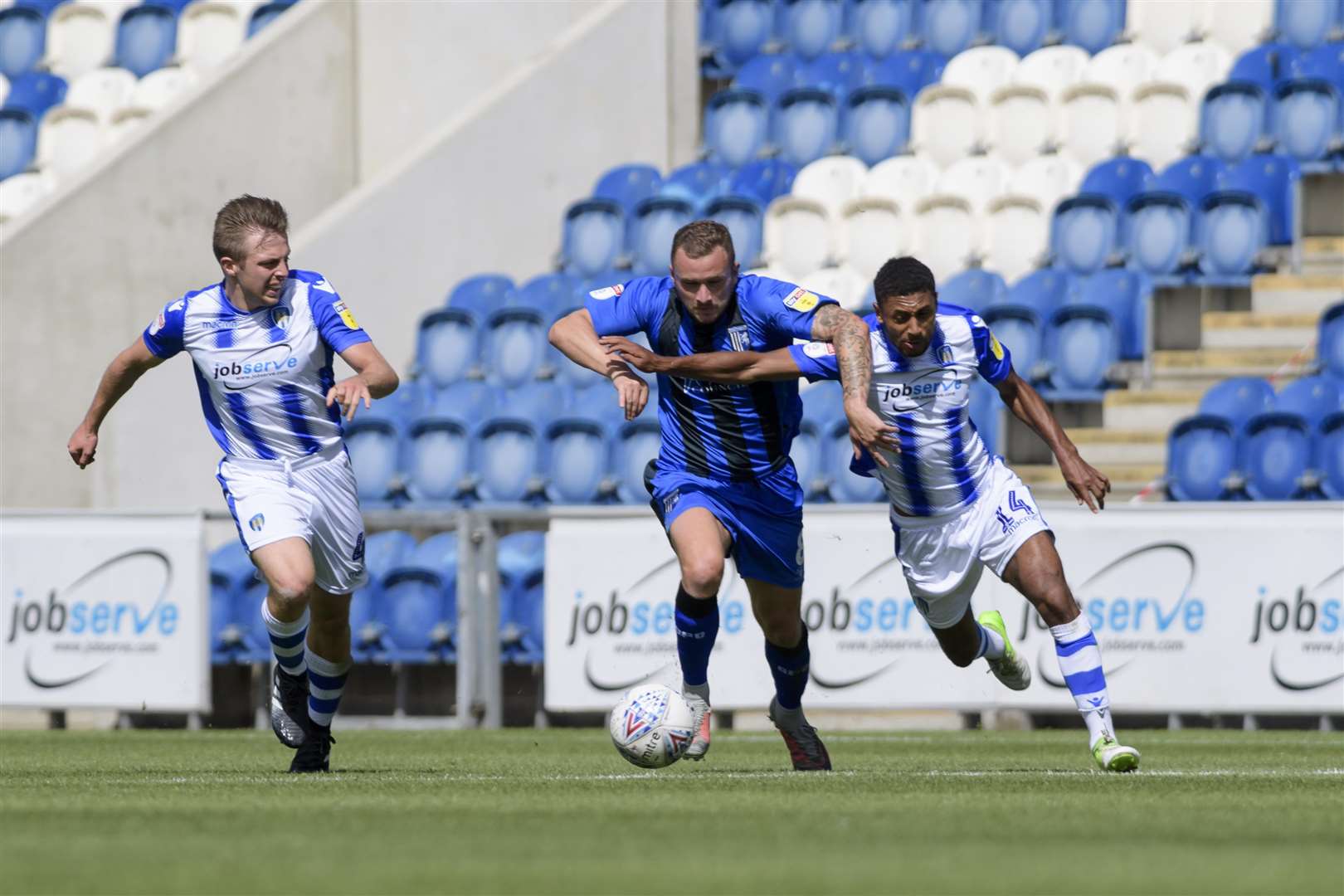 Dean Parrett, one of Gills' new signings, in action against Colchester in pre-season Picture: Andy Payton
