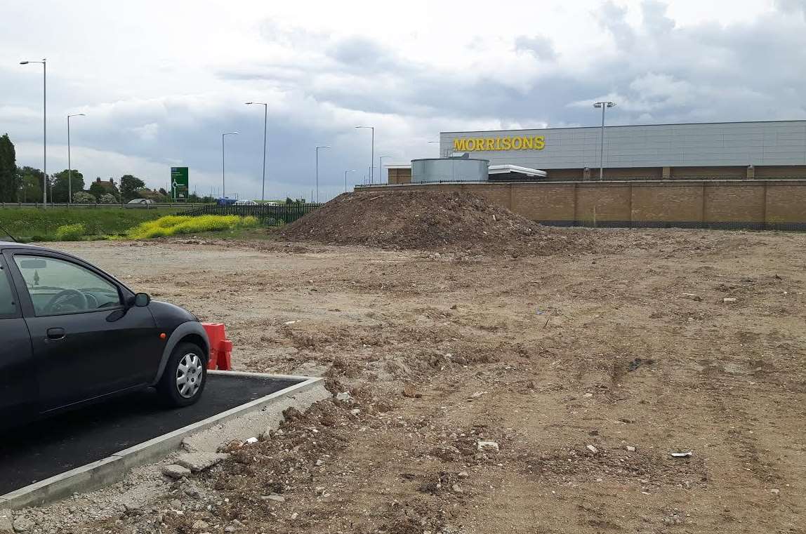 The empty plot where a new terrace will host Costa and Burger King at Queenborough's Neats Court.