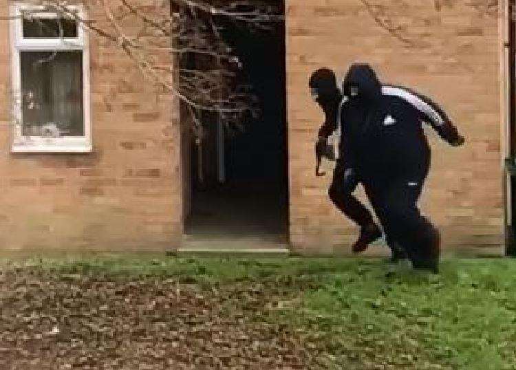 The two men were caught on film running from the scene