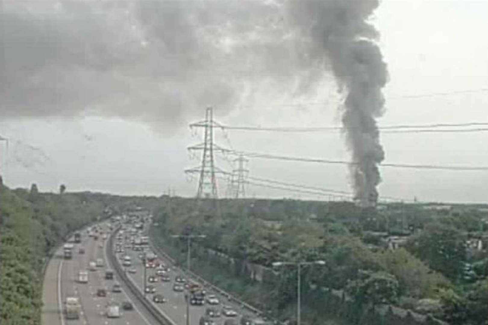 The fire near the M25 between junctions 10 and 11 can be seen for miles, say drivers. Picture: National Highways