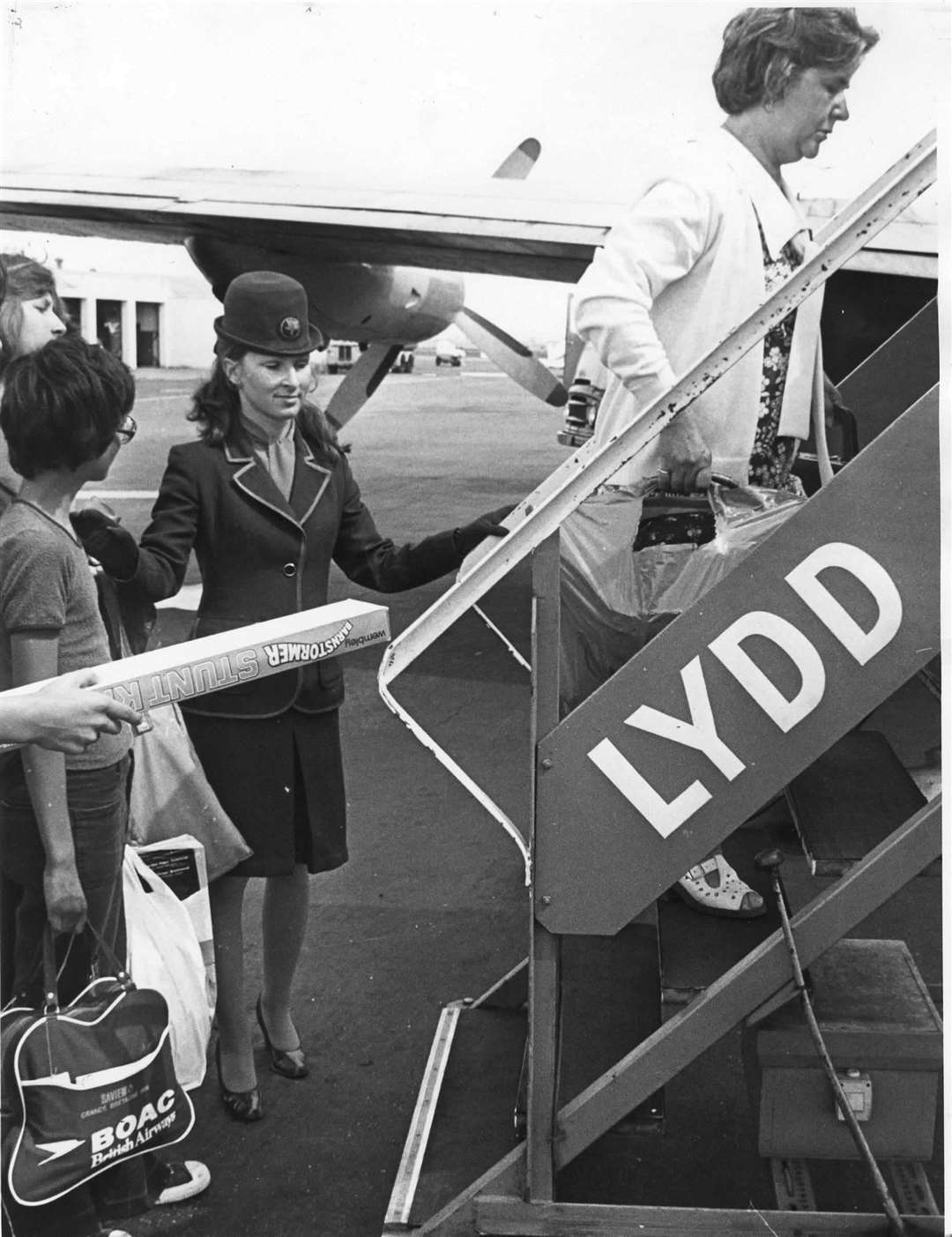 Passengers climb aboard a plane in Kent in 1976 during the hottest summer ever recorded