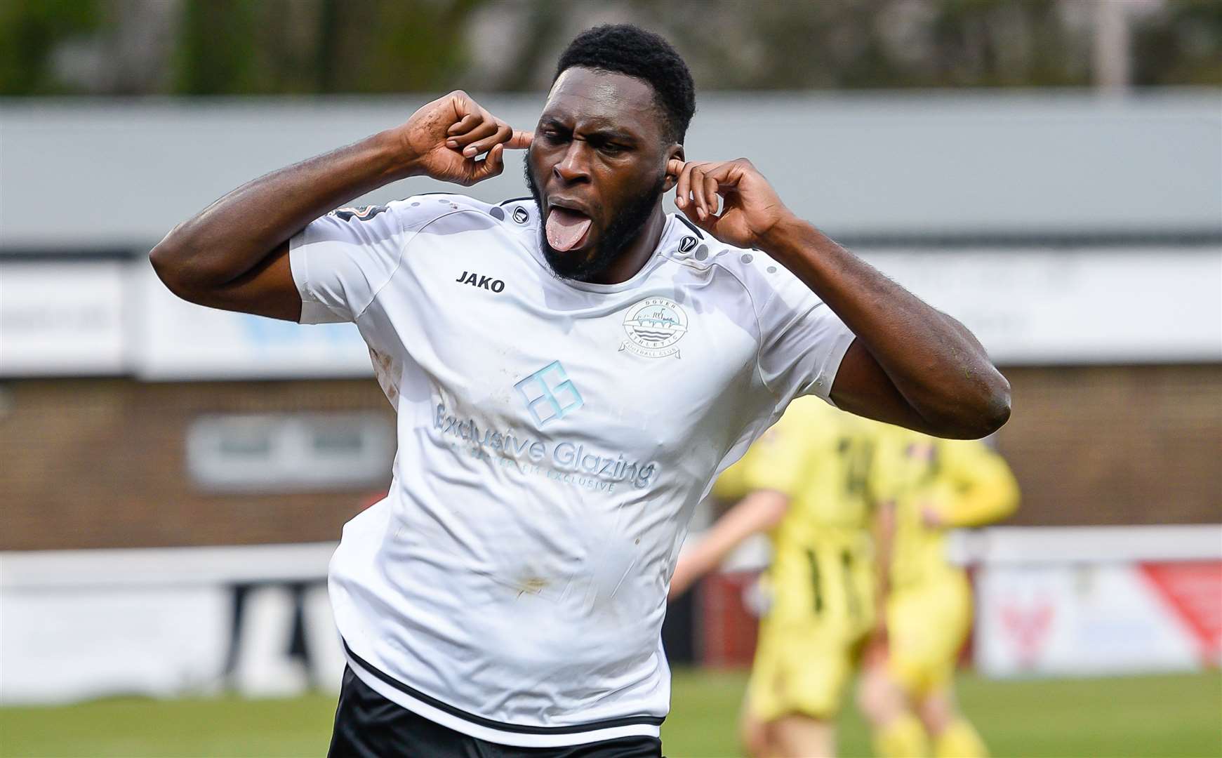 Inih Effiong celebrates scoring one of his three goals for Dover against the Coasters. Picture: Alan Langley