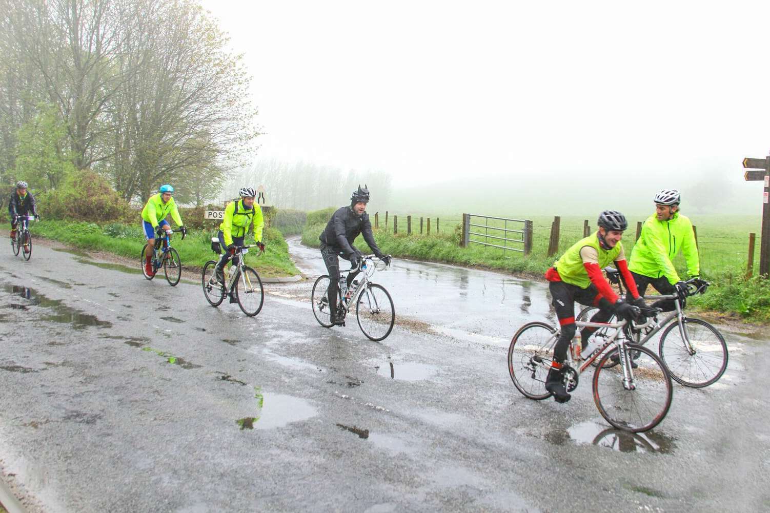 The cyclists faced wet and windy weather