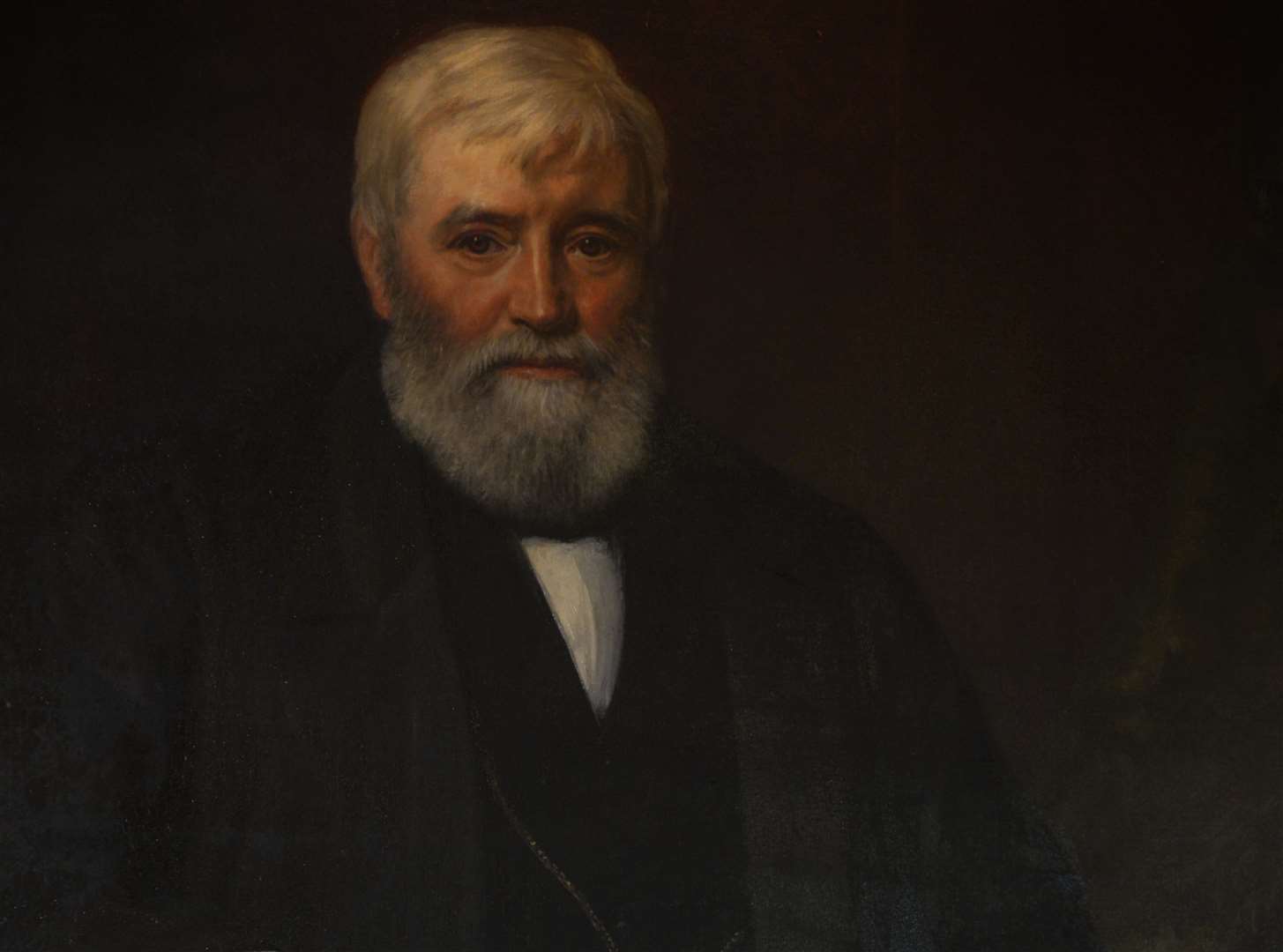A portrait of George Smeed who made a fortune through bricks