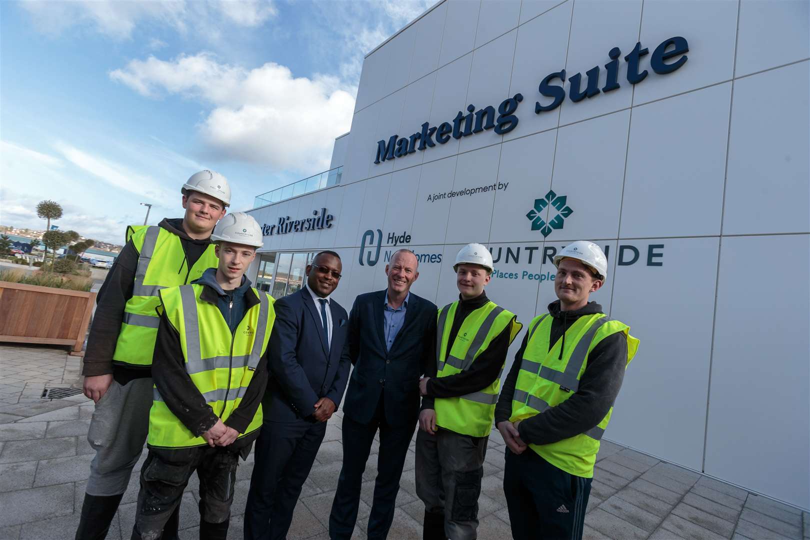 From left to right Jamie Davies (Carpenter), Aaron Shubert (Plumber), Deputy Mayor Cllr Habib Tejan, Andy Fancy (Managing Director, Partnerships South (North & South), Countryside) and Linus Whaley (Plumber) Steve Barnes (Bricklayer) (7649391)