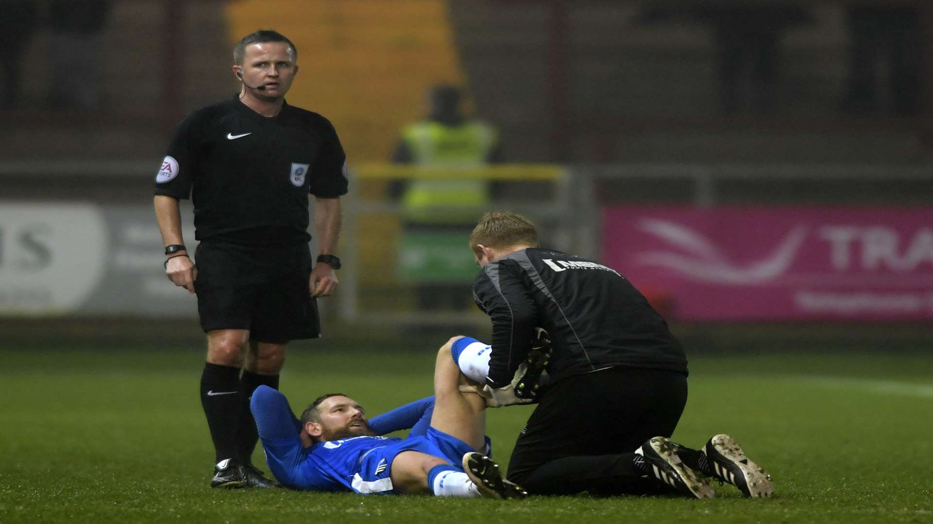 Physio Gary Hemens treats Scott Wagstaff on the pitch Picture: Barry Goodwin