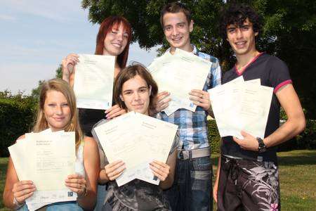 Valley Park School pupils Sarah Bryant, Emily Smith. Melanie Golding, Luke Attwood, Chris Dixon celebrate their A-level results. Picture: Valley Park School.