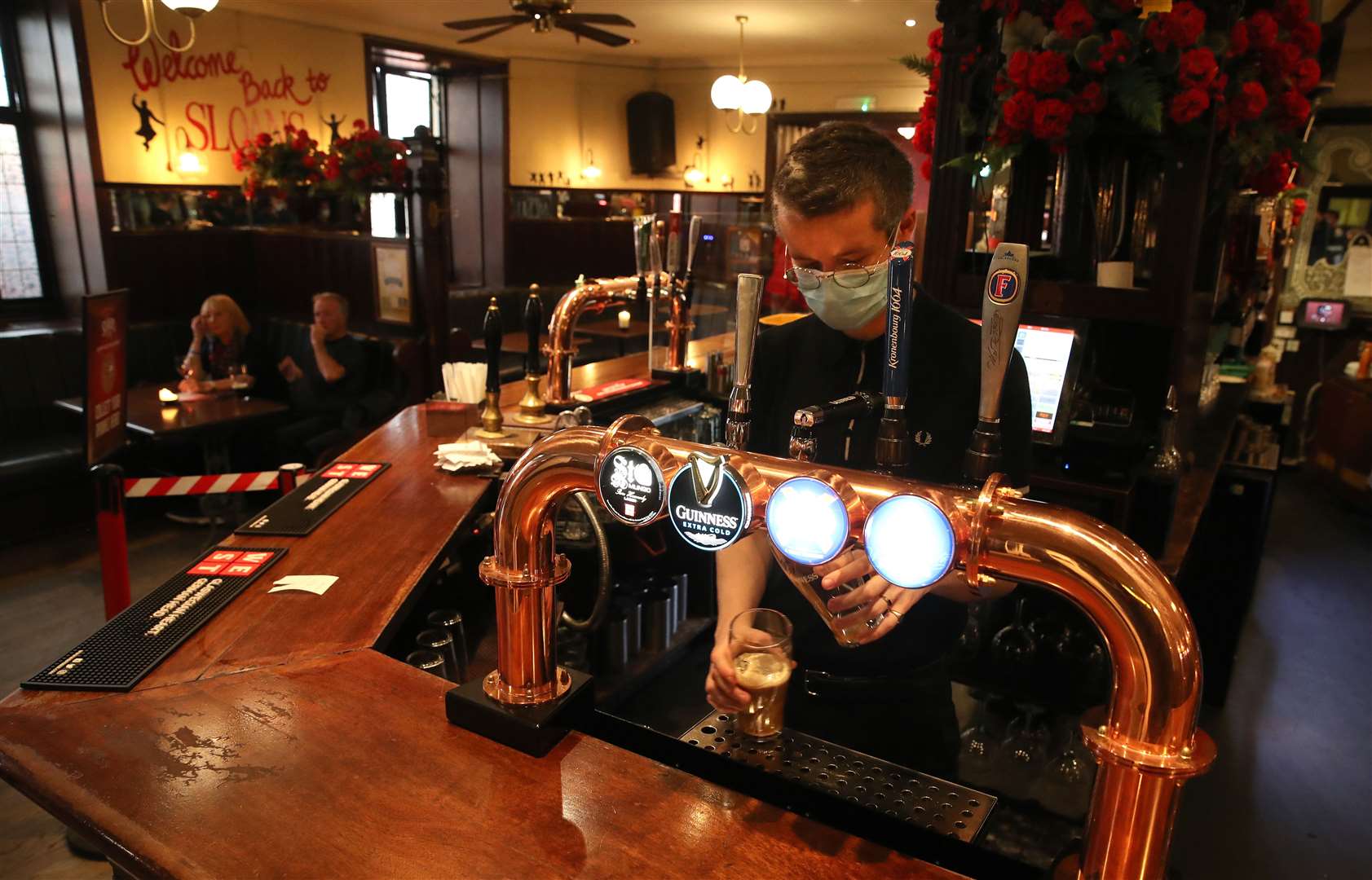 Pubs were reopened in July as lockdown measures were eased (Andrew Milligan/PA)