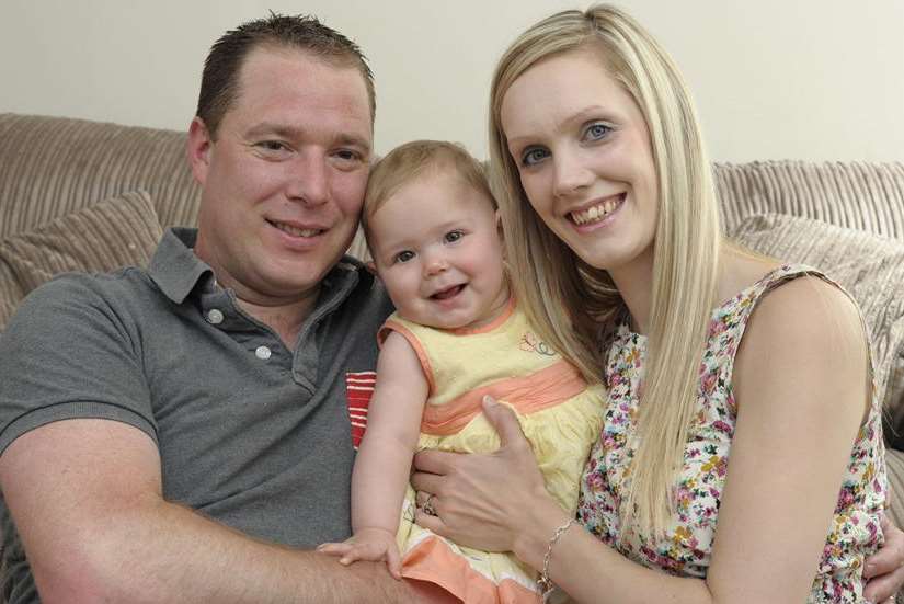 Martin and Gemma Richardson, with daughter Amelia