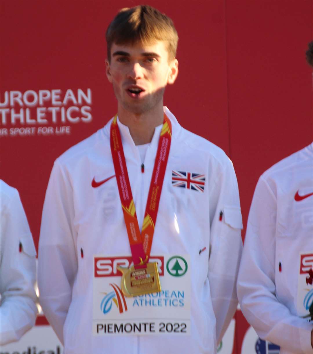 Matthew Stonier collecting his team gold at the European Cross-Country Championships in Piemonte, Italy, in December 2022