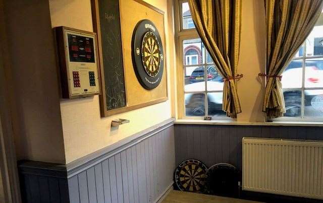 Dartboard #1 is at the front of the pub and, judging by the spare boards, it looks as if the game is taken seriously