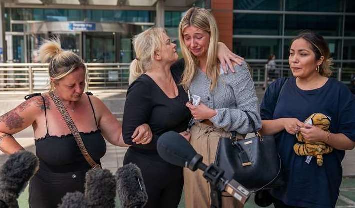 Hollie Dance, centre left, with her family and friends (Aaron Chown/PA)