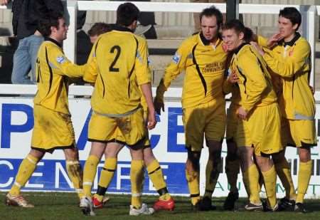 Welling celebrate their first goal at Woking on Saturday