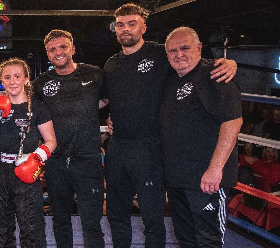 Monger alongside three of her coaches at the Whitstable-based club