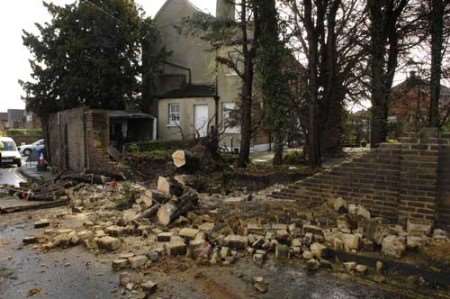 A fallen tree also brought down this wall in Northfleet. Picture: MATTHEW READING