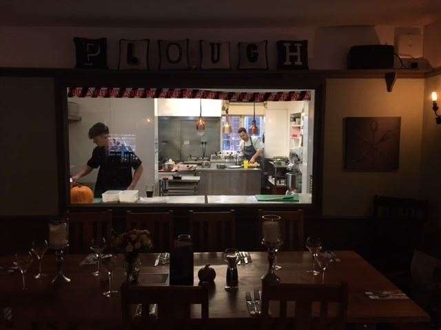 A full size window gives diners a front row seat to see what’s going on in the kitchen at The Plough