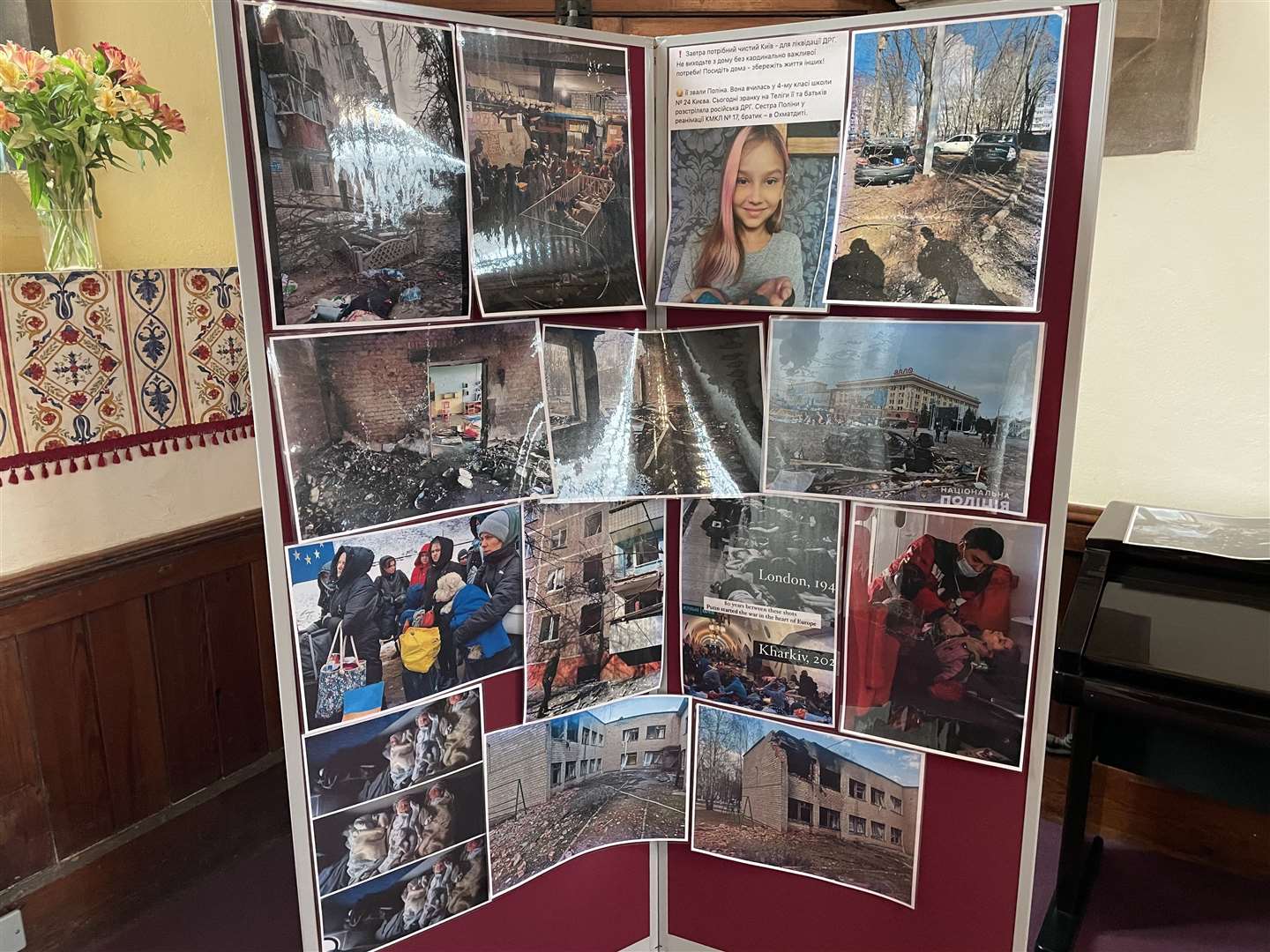 A board of pictures of the Ukraine crisis at Holy Trinity church, Coxheath
