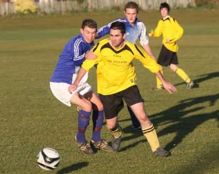 White Horse and Minster battle for the ball on Sunday