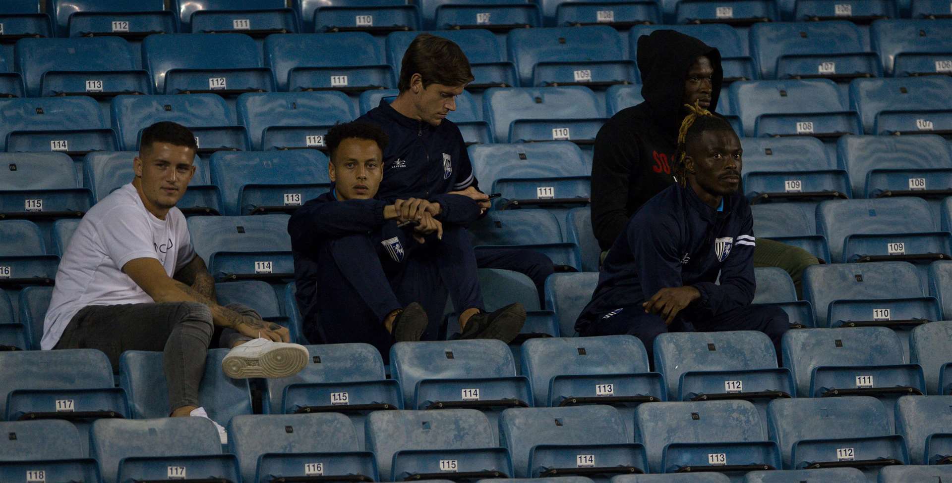 Gills' rested players watch from the stands at Millwall Picture: Ady Kerry