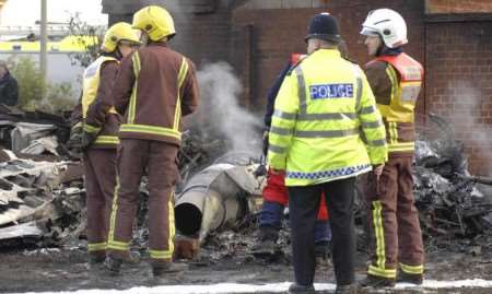 Police and fire and rescue workers at the scene of the crash