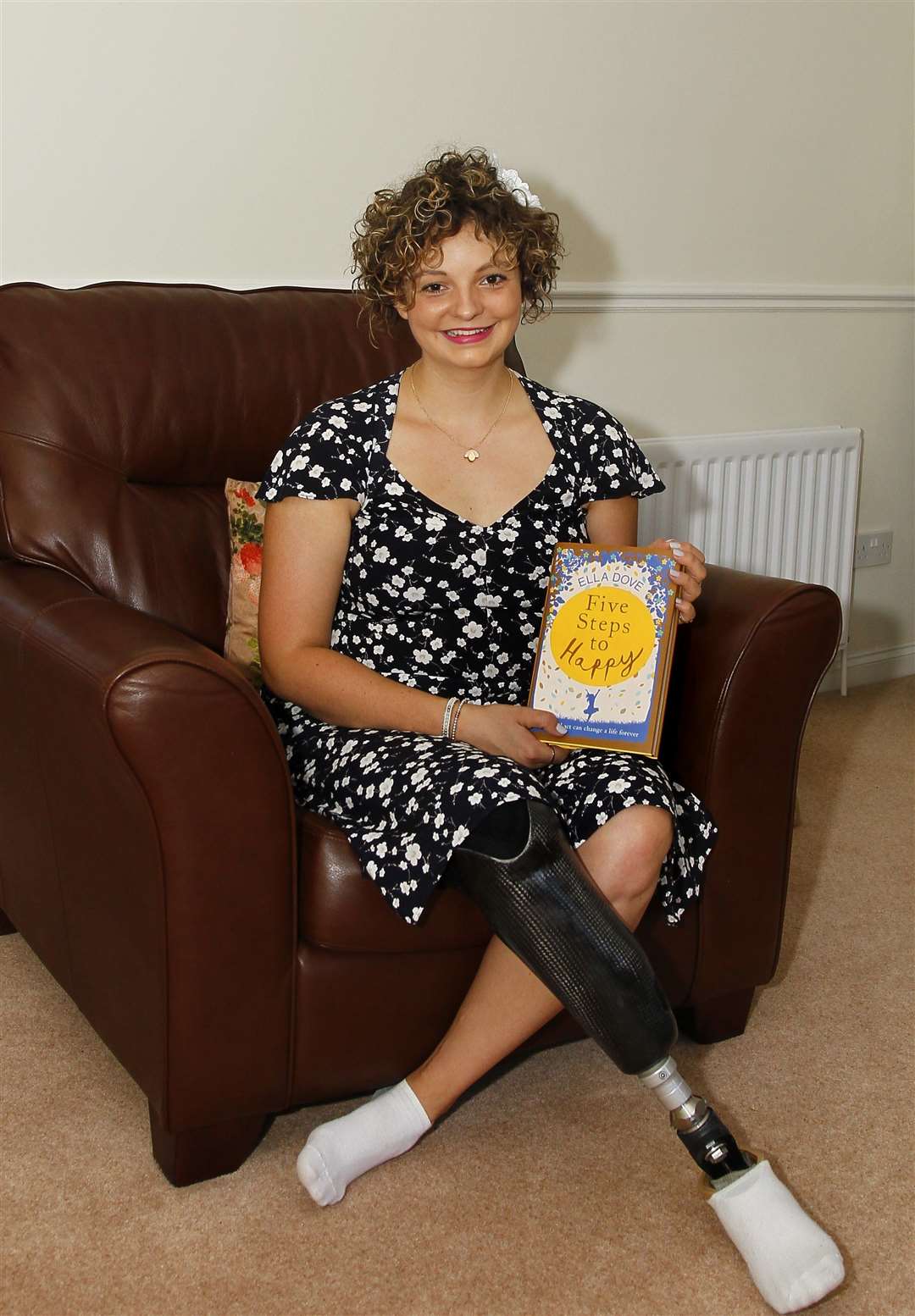 Ella Dove has released a book based on experience of tripping over while running and having a leg amputated. Picture: Sean Aidan