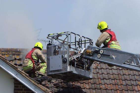 Crews used a height ladder and hose reels to tackle the blaze. Picture: Danny Mantle